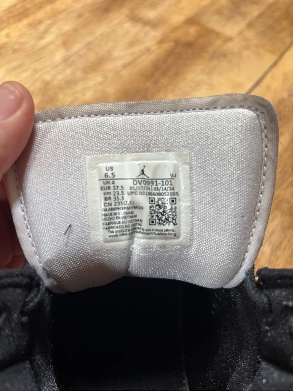 Jordan Black and White High-Top Sneakers